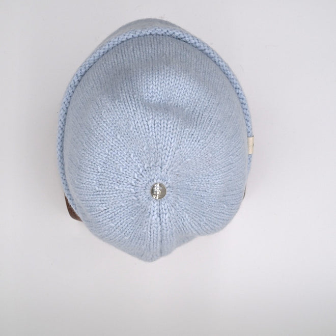 A mannequin wearing an Ice Blue cuffed Egmont beanie.