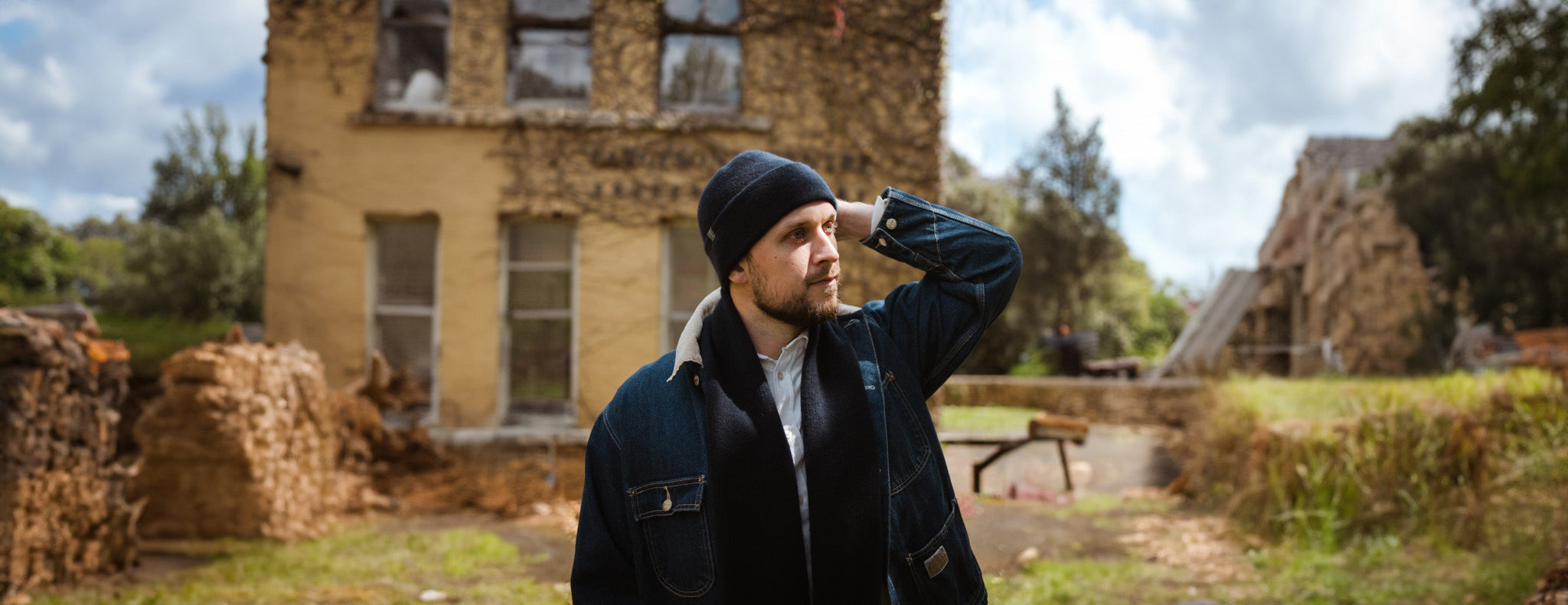 Man standing in front of old building