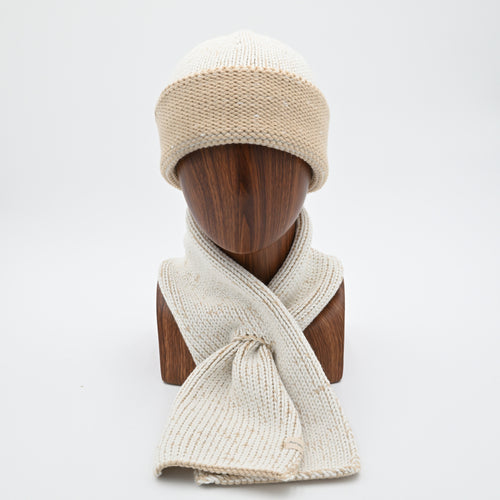 A mannequin wearing a marbled Cuffed Toque in Camaro Sam. The Toque features a silver bean at the crown. This is shown here with a matching Ascot Scarf.