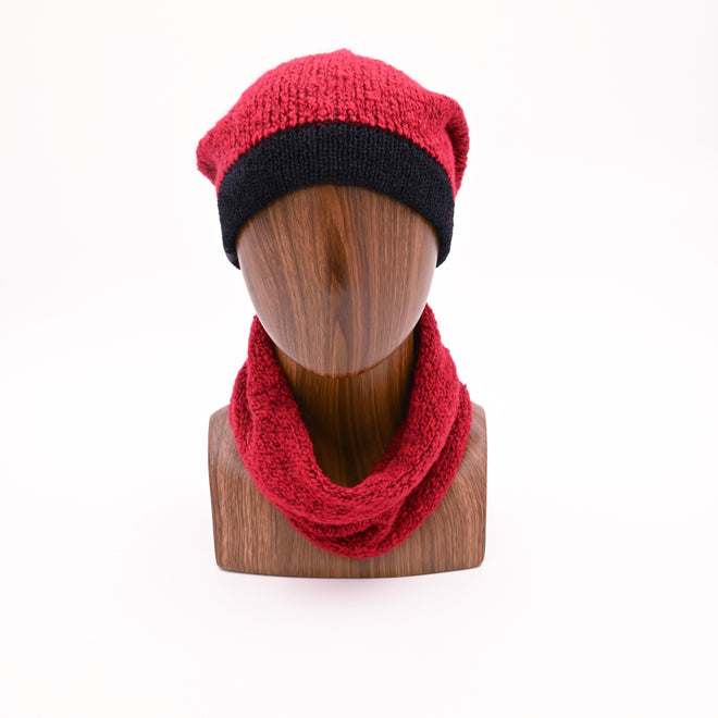 Mannequin wearing a red/black Slouchy Cowl Combo. The black band, adds style to the distinctive red top.