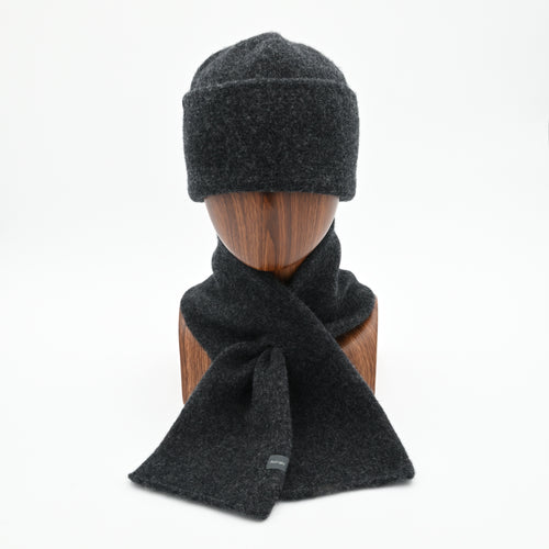 Mannequin wearing a Gunmetal Sub-21 felted Toque and matching Ascot Scarf.  Both made of lambswool.
