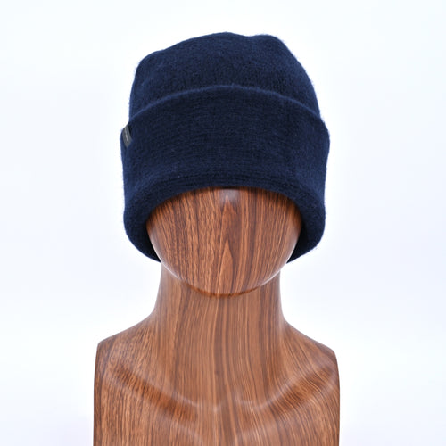 Midnight Navy Toque on a wooden mannequin head