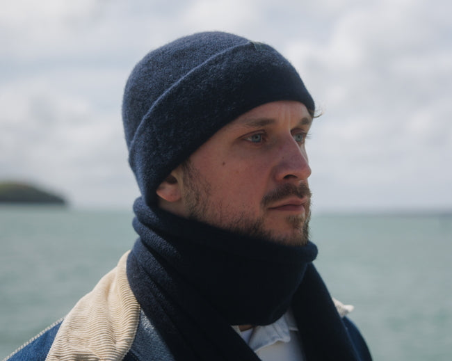 A Sub-21 cuffed and felted Toque in Midnight Navy